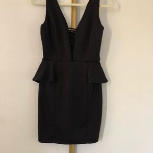 Black caged front peplum dress